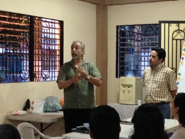 Ron teaching the Deacons & Leaders of Apopa.  Jose Elias translating