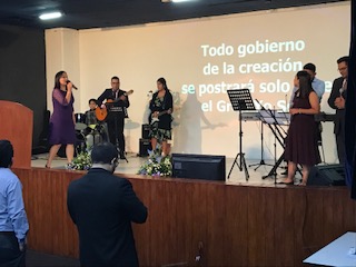 Pastor Jessica leading worship