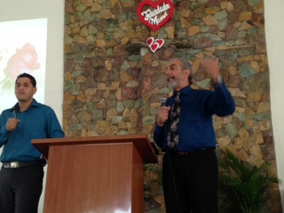 Ron preaching, Angel translating